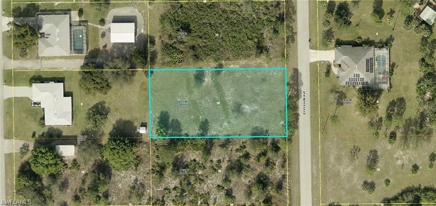 Residential building lot on a quiet low traffic street. Mostly cleared half acre lot.