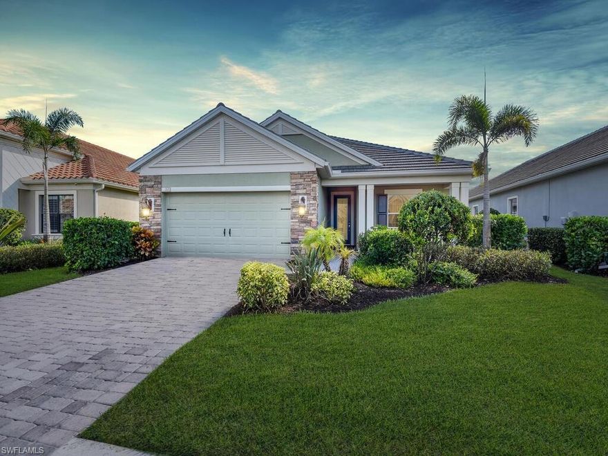 Welcome to the modern Key West style “Starlight” model, 3 bed, 2 1/2 bath home. Enjoy the long lake view from this open floor plan home. The covered lanai with electric storm shutters lead to the screened patio with the pool and waterfall feature. The open concept living room features coffered ceilings with recessed lighting. Enjoy the large kitchen island, with quartz counters and cabinets accented with neutral stone backsplash. The dining room has an abundance of natural light and lake views. The entire home makes for easy entertaining with the triple sliding door completely opened, allowing the indoor space to flow seamlessly to the outdoors. The master bedroom includes two large walk-in closets, a double vanity private bath with oversize walk-in shower. A double French door leads to the spacious den off of the entry foyer. This comfortable space to read or watch television can easily be repurposed to a fourth bedroom. The two car garage is improved with custom cabinet storage plus wall rack for bikes. Canopy is a gated community with 108 family homes with convenient access to I75 and major shopping and dining.  Located in top rated school district.