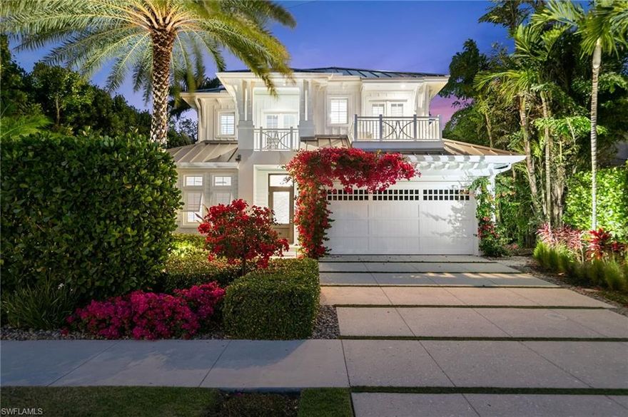 Welcome to your luxurious sanctuary in the heart of Old Naples, nestled along Fifth Street South! Crafted by the renowned builder London Bay Homes, this bespoke residence radiates meticulous attention to detail, exquisite finishes, and an aura of sophistication, promising an unparalleled lifestyle just a leisurely stroll from the Gulf of Mexico and the vibrant culinary and shopping hotspots of Fifth Avenue and Third Street South. Spanning over 4,100 square feet of meticulously designed living space, this extraordinary home features five bedrooms, five full bathrooms, and a convenient powder room adjacent to the pool. Every aspect has been thoughtfully curated to offer the epitome of refined living.

Upon entry, be welcomed by the grandeur of specialty ceiling and wall treatments, complemented by wire-brushed ash flooring that infuses warmth and character into the main living areas. The fusion of wood tones, metals, and crystals creates a contemporary elegance throughout. Entertain effortlessly in the open-concept floor plan, where the dining room, featuring a sleek linear fireplace, comfortably accommodates eight. The kitchen is a chef's delight, boasting a blend of wood and high-gloss white cabinetry, a sprawling island, and top-of-the-line appliances including a dual-fuel range, steam oven, and Sub-Zero refrigerator.

Flowing seamlessly from the great room, pocketing glass doors lead to the outdoor oasis, where a covered living area, expansive pool deck, and outdoor kitchen await. Bask in the Florida sunshine or unwind in the shade of the covered lanai, complete with a fireplace for cozy evenings under the stars. Retreat to the spa-like primary suite, featuring a vaulted ceiling, dual walk-in closets, a freestanding soaking tub, and a luxurious shower.

An additional guest bedroom on the main level ensures privacy comfort and convenience for visitors, while three en-suite bedrooms, a bonus room, and two balconies upstairs offer private accommodations for family and friends. Outside, the pool deck with a stone-clad wall and water feature, sunken spa, and a fire pit with seating on a raised platform deck create an enchanting ambiance, perfect for alfresco gatherings and cherished moments with loved ones.

Experience the epitome of Naples living in this exceptional residence, where luxury knows no bounds and every day feels like a blissful getaway.