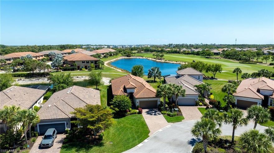 LIVE A VACATION LIFESTYLE IN ESPLANADE! FULL GOLF MEMBERSHIP INCLUDED! This immaculate and well appointed “Lazio” is situated on an oversized cul-de-sac lot overlooking two lakes and the 7th green. Inside, you will find 3 bedrooms, den, 3 full baths, and just 2300 sq ft of open concept living space. From the moment you walk in the door, you are greeted with wood floors throughout the common areas and two sets of sliding glass doors to the extended lanai complete with outdoor kitchen and can be enclosed by motorized roll down hurricane screens. The kitchen is the heart of the home and features raised panel cabinetry, Cambria quartz countertops, and stainless steel appliances including a GAS range. Other fine appointments include: oversized tandem 3 car garage; freshly painted exterior; stone detail on the front of the home; new HVAC; crown molding & wainscoting details; brand new ceiling fans throughout; master bedroom closet built-ins; plantation shutters on all windows; walk-in showers in all baths; hurricane impact front door with matching sidelights; spacious Laundry Room with cabinetry; 8' doors/10' ceilings; and more!

Esplanade Golf & Country Club of North Naples offers a true “Lifestyle Community” with world-class amenities, including a resort pool with cabanas and the popular “Bahama Bar,” tennis, pickleball, bocce, a 14-mile network of bike/walking trails, and an 18-hole private golf course. The impressive 15,000 Sq Ft clubhouse features a restaurant, bar, wine-tasting room, wine lockers, and a Starbucks-style café. Best of all, the property’s landscaping, irrigation, golf membership, and all community amenities are covered under a quarterly fee of just $3,743—no additional fees or memberships required! Don't miss your opportunity to own this exceptional home in one of Naples’ most sought-after communities. Schedule your tour of this stunning home and Esplanade Golf & Country Club today! COMING SOON TO ESPLANADE (2026): Fully renovated and expanded poolside Bahama Bar; expanded outdoor bar at the Barrel House; expanded golf practice range; and an AIR CONDITIONED INDOOR PICKLEBALL COMPLEX with four indoor courts.