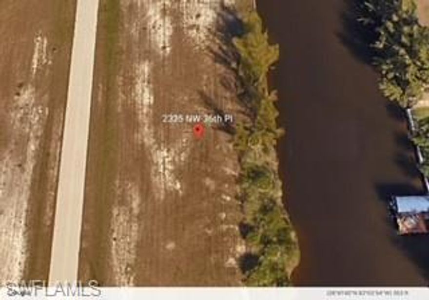 Perfect site for your dream home.  Great for early risers with sunrise view on patio. Unit 61 - Gulf access- 125ft wide canal. Only one bridge to navigate under and miles of waterfront canals to navigate by kayak. The Cape Coral Municipal golf Course is nearby and location offers easy access to I-75 and Punta Gorda Airport.  No assessments presently.  Agents see confidential remarks for seller’s terms.