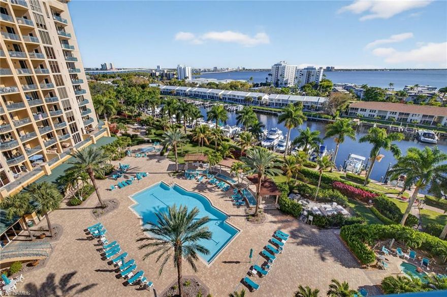 Live the waterfront lifestyle at its finest with unparalleled amenities and a prime location. Enjoy coffee on the lanai overlooking the pool and spa, marina, waterfront, and downtown Fort Myer's skyline from this wide open Libra floor plan with true hard wood floors. Remote blinds in the living and dining area. Meticulously maintained with every detail. Includes two interior parking spaces, a 9'x7'x10' garage storage closet and a bonus floor storage closet measuring 4'x8'. This one is a must see condo that comes completely furnished turnkey to get your Florida lifestyle started right away. Live in luxury at North Star and take advantage of 15,000 sq.ft. of amenities, including a clubhouse, business center, meeting rooms, theatre, aerobics and fitness center, steam and locker rooms, and a southern-facing heated pool and spa—all set amidst 12.5 lush waterfront acres. For boating enthusiasts, the option to lease a slip at the marina awaits, or simply stroll down to four waterfront public restaurants along the marina promenade. Embrace the convenience of a free seasonal trolley to explore the newly revitalized River District of downtown Fort Myers, featuring over 60 restaurants, shops, galleries, theaters, boutiques, and more.