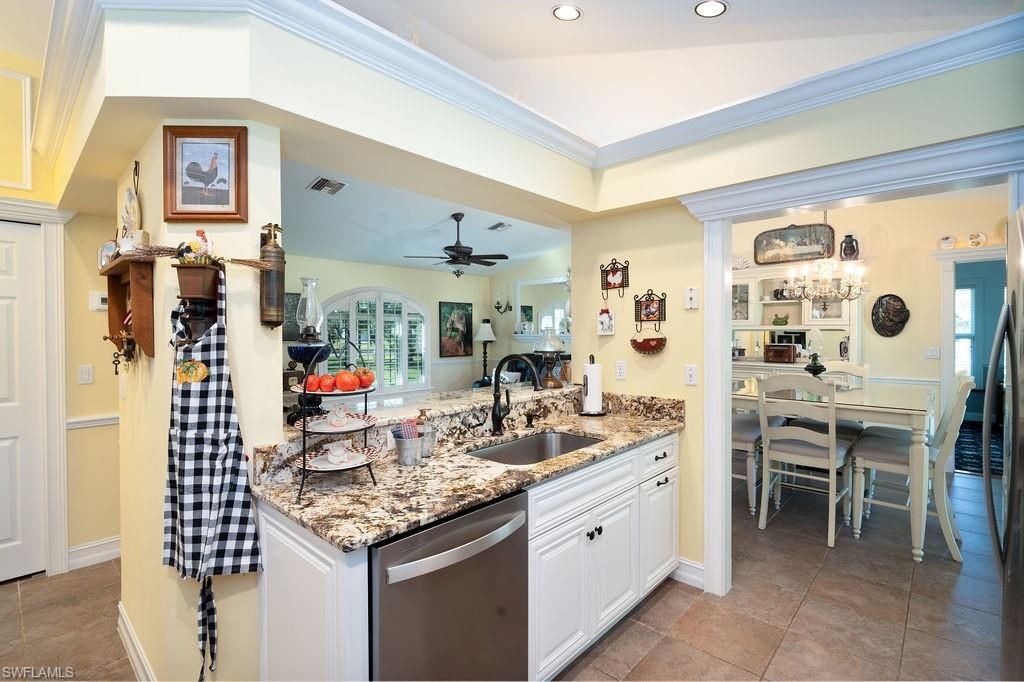Photo of 2421 22nd AVE NE, NAPLES, FL 34120 (MLS # 226021352)