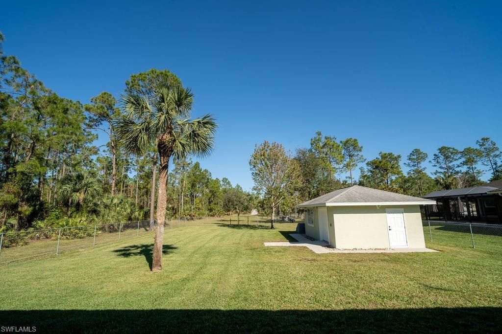 Photo of 2421 22nd AVE NE, NAPLES, FL 34120 (MLS # 226021352)