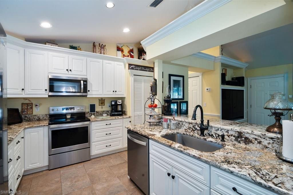 Photo of 2421 22nd AVE NE, NAPLES, FL 34120 (MLS # 226021352)