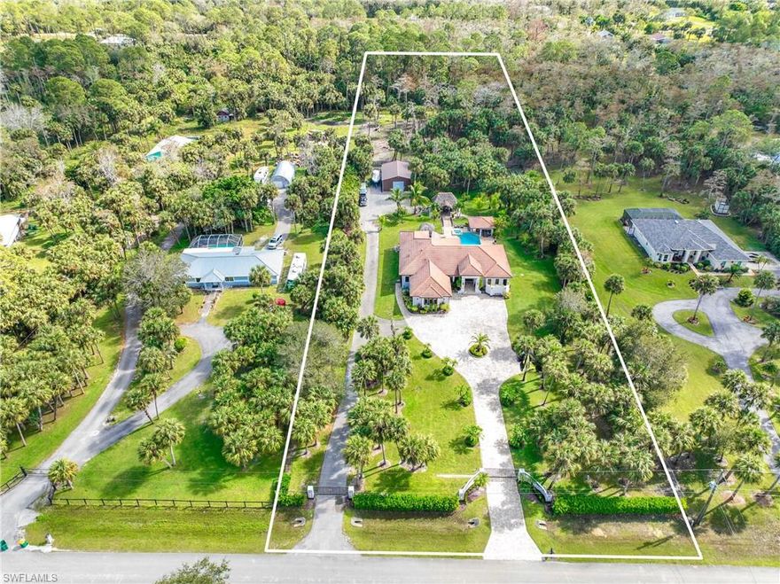 Luxury Resort Living & Privacy at Its Best! Located on 2.73 Acres in The Estates, Experience the epitome of privacy, luxury, and convenience in this exceptional estate. Nestled on 2.73 acres of meticulously landscaped grounds, this home is a true oasis, offering the finest in modern living combined with ultimate privacy. The fully automated, state-of-the-art security system, two gated entryways, ensures privacy and security while offering ease of access without HOA restriction. A 30x40 detached metal storage building, fully insulated, provides ample space for all your toys, tools, or additional storage needs. Enjoy year-round comfort with two AC units, each with a custom thermostat in each bedroom for personalized climate control. The home features an electrical panel connection for a generator, ensuring you're prepared for any situation. The automated irrigation system keeps the lush landscaping pristine with minimal effort. The stunning Interior features High trey ceilings and custom details throughout creating an open, airy ambiance. The spacious formal dining room is perfect for hosting gatherings in style, and the chef-inspired kitchen is a true highlight, featuring granite countertops, stainless steel appliances, and a large central island—ideal for meal prep or casual entertaining. The luxurious master bedroom offers an expansive retreat with custom closets and a spa-inspired master bath with granite countertops, and a walk-in shower. All bedrooms feature custom closets, TWO MASTER ROOM offering generous storage space and a personalized touch. Elegant porcelain tile runs seamlessly through the home, offering a stylish, low-maintenance flooring solution that complements the overall design. The entire home is wired for SONOS surround sound, both inside and out, ensuring you enjoy your favorite music in every room, including the pool area. Step into your personal paradise with a luxurious swim-up Bar pool, a fully equipped outdoor kitchen, and a Tiki area perfect for entertaining or simply unwinding in style. and expansive outdoor amenities make this a one-of-a-kind property, reverse osmosis and more. This stunning estate offers the ideal balance of luxury, convenience, and privacy. Whether you're hosting friends in your resort-style backyard, retreating to the sanctuary of your master suite, or enjoying the high-end finishes throughout, this property provides the lifestyle you've always dreamed of.