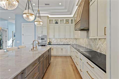 Photo of 211 San Mateo DR, BONITA SPRINGS, FL 34134 (MLS # 226025188)