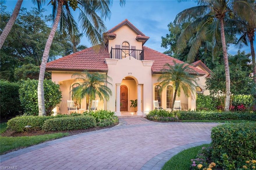 Enjoy being two blocks to the beach and moments to restaurants, shopping and entertainment from this charming, Spanish Mission-style home, built by Foresite Builders. Travertine stone and wood flooring, crown and base molding, ceiling details, impact windows, solid core and French doors open to a stunning outdoor living space with built-in gas fireplace, grill area with ice/beverage refrigerator, pool and spa, water feature, half-bath and shower. Details for effortless entertaining in the great room include a Sub-Zero refrigerator, Thermador convection wall oven, six-burner gas cooktop, microwave, warming drawer, Bosch dishwasher, large island with granite countertops, separate beverage area with a U-Line wine cooler and home audio system. The first-floor master retreat features two large walk-in closets, French doors overlooking the pool, separate vanities and lovely outdoor, trellised garden shower with fountain. There are three spacious guest en suites, including one detached guest suite with private entrance and balcony overlooking the pool. Beautifully arched windows, quaint front porch, circular driveway and lush landscape welcome and invite you to enjoy the Naples lifestyle.