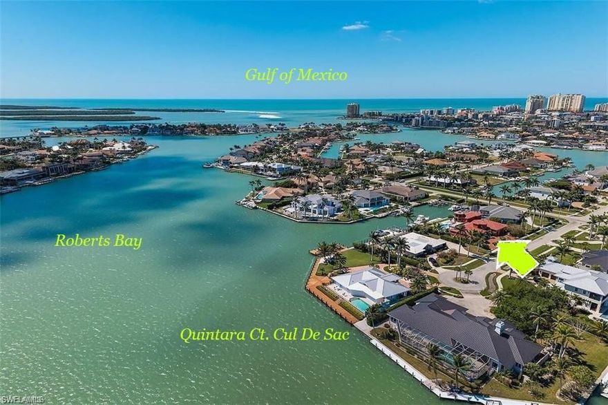 YACHT FRIENDLY Waterfront Marco Island Estates Roberts Bay SOUTHERN EXPOSURE 125’ of Waterfront DIRECT GULF ACCESS Custom-built home nestled on a private cul-de-sac in the prestigious Estates section,one of only 8 homes.Quick deep-water access to the Gulf via Caxambas Pass, this property is a boater’s dream. Positioned on .43 acres, the residence offers exceptional outdoor living,expansive water views,resort-style amenities. A concrete 80’ BELLINGHAM floating dock, with Ramp, Propane-heated Saltwater Pool & Spa make this the ultimate retreat for yachting enthusiasts. 5,895 sq. ft. under air, 4 Bedrooms lower level , 2 bonus rooms upper level,3 Full + 2 Half Baths.Upper deck (1,090 sq. ft.) + expansive lower pool deck (2,850+ sq. ft.) Library with custom wood cabinetry, indoor dual gas fireplace, chef’s kitchen with Viking Gas Stove, Sub-Zero, and Bosch appliances, plus 2 wet bars. Fully equipped Viking appliances OUTDOOR KITCHEN. Imported mahogany doors, imported 3/4 " Jatoba hardwood floors. IMPACT GLASS throughout, 5-ZONE A/C Whole-house water filtration. Central vacuum, Central Alarm w/cameras, SONOS sound system, epoxy-coated 3-car garage. Lush, mature native landscaping ,fenced side yards for privacy. Located about 1 nautical mile to Caxambas Park Fuel Dock and 1.25 miles to Winterberry Beach Access. This rare offering delivers the perfect blend of tranquility with panoramic wide-water views, premier boating infrastructure, and an unmatched location in the heart of Marco Island.