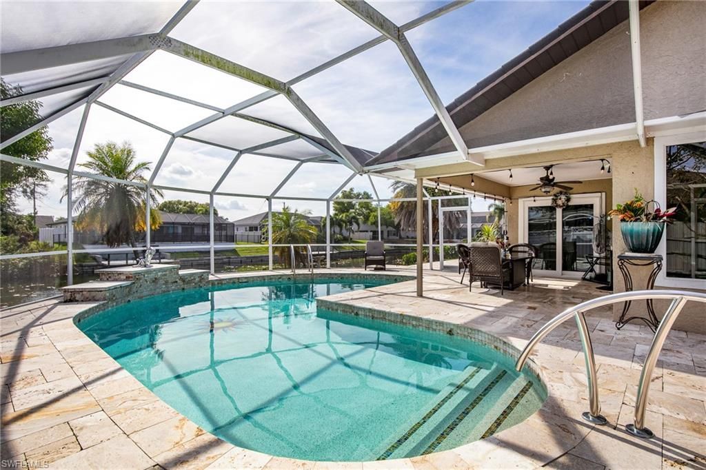 Photo of 1216 Hancock Bridge PKWY, CAPE CORAL, FL 33990 (MLS # 225083573)