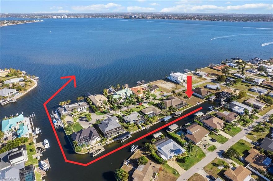 Premium waterfront homesite with DIRECT SAILBOAT GULF ACCESS just minutes to open water. Enjoy approximately 2 minute boating access to the Caloosahatchee River with no bridges, no locks, and unrestricted water access. NEW SEAWALL with a high bulkhead is already in place, making this property shovel-ready for your custom waterfront dream home. Located in the highly desirable Tarpon Point area of Cape Coral, this lot is surrounded by newer luxury waterfront residences and impressive riverfront estates. Positioned across the street from stunning riverfront mansions, your future home will be in exceptional company in one of Southwest Florida’s most prestigious boating corridors. Boaters will appreciate the proximity to Tarpon Point Marina and The Westin Cape Coral Resort, along with some of the area’s top waterfront restaurants, including Marker 92, Gather, High Tide Social House, and Pinchers. Arrive by boat, car, or bike and enjoy the ultimate Florida coastal lifestyle. This Gulf-access homesite is also located in Cape Coral’s most dynamic waterfront redevelopment corridor. The transformational Yacht Club Beach and Marina renovation will introduce resort-style pools, expanded marina facilities, waterfront dining, boutique retail, and vibrant community gathering spaces, further enhancing long-term property values. Just minutes away, The Cove at 47th is emerging as South Cape’s walkable downtown destination featuring Oak and Stone with a rooftop bar, Aqua Seafood and Steaks, Big Nick’s BBQ, Seed and Bean Market, and additional waterfront dining concepts opening through 2025 and 2026. Nearby Bimini Square continues its phased openings, with waterfront restaurants, boutique retail, Lee Health medical services, and public marina access, all designed around a live-work-play environment. With Tarpon Point Marina, The Westin Resort, Palmetto Pines Country Club, and Coral Oaks Golf Course all nearby, this property offers the rare combination of direct sailboat access, new seawall infrastructure, luxury surroundings, and strong future growth potential. Build your custom Gulf access estate in one of Cape Coral’s most sought-after waterfront neighborhoods.