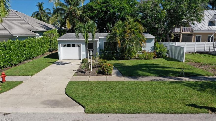 Imagine everyday... Walking to all of the most desirable locations in Old Naples -- only 3 blocks to our gorgeous sandy beach for sunset or a refreshing stroll,  2 blocks to 5th Ave South for dinner & drinks, just 5 short blocks to 3rd Street South for breakfast, or lunch, or shopping after a visit to the farmer's market Saturday morning...  "Tennis anyone ?"... let's go for a game to Cambier Park... again just a few minutes walk. This little 7th Avenue South home on an 8000+ sq. ft. homesite truly delivers on the location, location, location anthem! Just visit the street scene and beauty of the lovely Royal Palm lined avenue close to gently curving West Lake Drive - offering the charming mixture of lushly finished palatial mansions and uniquely renovated older homes that you can only find in Old Naples.