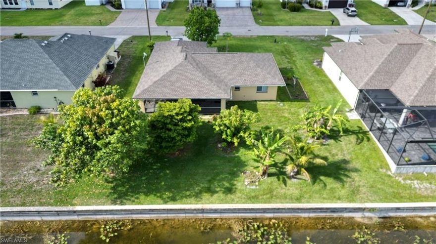 Priced To Sell Fast!!! Selling a lovely 3 bedrooms and 2 bathroom home on the canal in Cape Coral, Florida!

*City water and sewer assessment, fully paid by seller! *Not in a flood zone! *Never has been flooded
*New Roof installed in 2023 *New AC installed in 2024 *New garage door installed in 2023 *New stove installed in 2023  * Dishwasher replaced in 2023 * 4 Fruit Trees (2 Mango Trees, 1 Avocado Tree, 1 Banana Tree and 1 Sapodilla Tree) 

*Great Location!!! * Close to shops, restaurants, schools, places of worship, parks, golf and supermarkets)