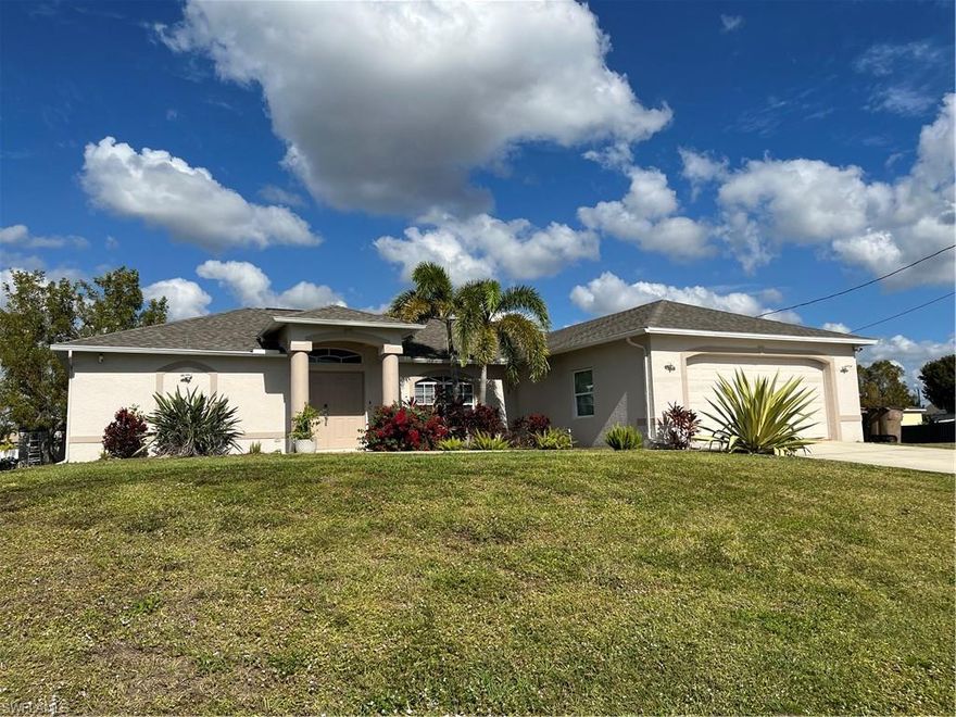 This beautiful home in Cape Coral is ready for you to make it your own!! This modern house features an open floor plan with natural lighting throughout. This house offers 3 bedrooms, 2 bathrooms, with the garage converted to another bedroom!! Elegant porcelain flooring throughout the living and kitchen area, complemented by modern laminate floors in the bedrooms. The kitchen has granite countertops, wood cabinets, stainless steel appliances and a pantry. Fresh paint, new roofing and water system after Ian. Large pool with screen!! THIS IS THE TIME TO BUY.