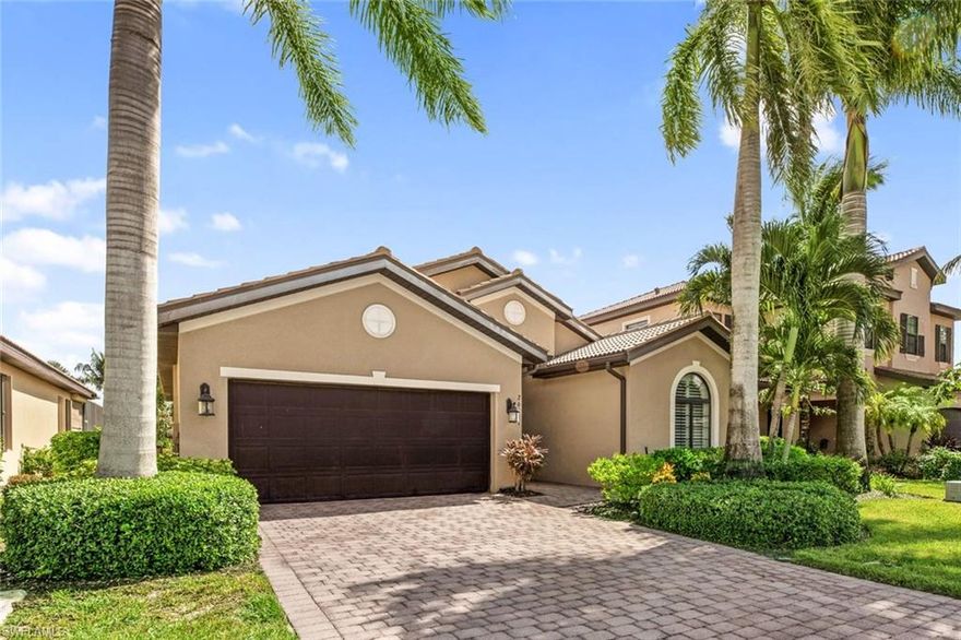 Welcome Home!! ONLY single family available in Paloma !  Come see this open floor plan that is a 3/2 just over 1800 sqft.  There are 10ft ceilings with Crown molding. The kitchen features 42" cabinets, granite counter tops, and stainless steel appliances. The master bedroom is impressive with a tray ceiling and the ensuite features a walk-in shower, soaking tub, and dual sinks. A private quiet lanai with a lake view! Nestled within a lush gated community in the heart of Bonita Springs, you'll find convenience and tranquility coexisting harmoniously. Unwind just minutes away from the vibrant lifestyle of Coconut Point & the Promenade and only a short 15-minute drive to some of Florida's most breathtaking beaches. Plus, SWFL airport is just 20 minutes away, making travel a breeze. Don't miss out on this exceptional opportunity! Enjoy as your primary home, vacation getaway, or as an investment. Call today to schedule your private showing!