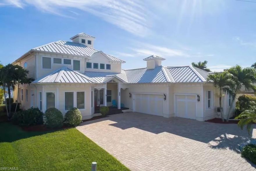 SHORT-TERM VACATION RENTAL ONLY - WEEKLY RENTALS WELCOME! ASK FOR A PERSONALIZED QUOTE WITH OFF-SEASON AND DISCOUNTED PRICING! 
This gorgeous river house is located on the Caloosahatchee River in Cape Coral's prestigious Gold Coast area. It features four bedrooms, three bathrooms, a heated pool, a screened lanai, a terrace, and a balcony on the second floor. The house is fully equipped and furnished, featuring a 2-zone A/C system, a Hot tub, WiFi Internet, a Captain's Walk/boat dock, a boat lift, a BBQ grill, and a 2-car garage. NESPRESSO Coffee Maker: Bring your favorite pods or capsules. Large dining table and many lounges. Amenities: Boating, fishing, golfing, tennis, biking, shopping, swimming, walking the beach, enjoying sunsets, and just relaxing. As for fine dining, we have over 1500 restaurants in the area. There is Sun Splash water park, a go-kart track, mini-golf, horseback riding on the edge of the Everglades, and much more for the kids. Bush Gardens in Tampa is just 2 hours away by car, and Disney World in Orlando is 3 to 4 hours away by car. A boat lift is available, and guests can rent a boat from a local boat rental company. The Boat Lift is NOT part of the rental agreement, but is free to use. We DO NOT offer rental boats.