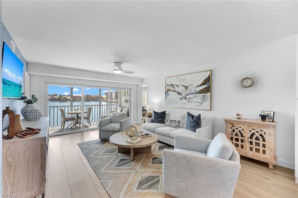 Photo of 10682 Gulf Shore DR #101, NAPLES, FL 34108 (MLS # 225011786)
