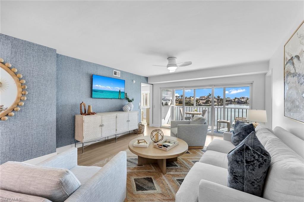 Photo of 10682 Gulf Shore DR #101, NAPLES, FL 34108 (MLS # 225011786)