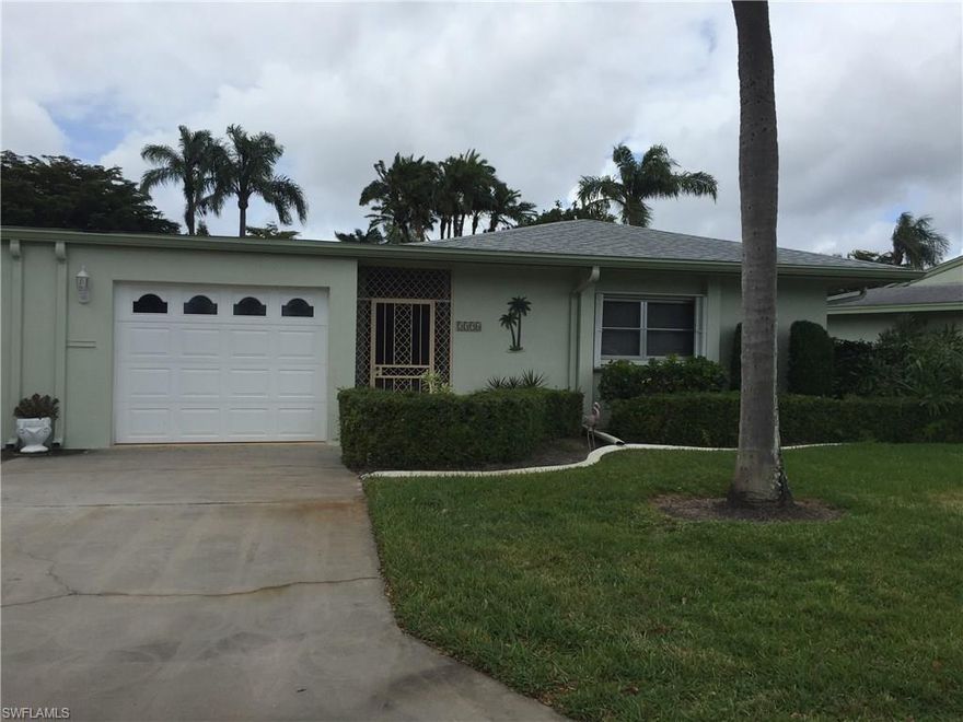 Best Priced unit in Whiskey Creek Village Green.  Light and Bright, CLEAN and attractively furnished.  TURNKEY, attached villa wit a GARAGE just waiting for its new owner.  Unit sits at the end of a quiet cul-de-sac.  The lanai runt the entire back of the unit and is HUGE.  Lanai has sliding vinyl panels and is also screened.  Overlooks a pretty landscaped area with the community HEATED pool just a short walk away.  Kitchen has granite countertops and newer appliances.  Unit contains a spacious laundry room with office space and lots of closet space.  All windows and doors have hurricane shutters.  Enjoy the amenities of the Whiskey Creek Country Club, just a short walk or golf cart ride, with reasonable golf or social memberships.  Golf is also open to the public.  Low maintenance fee of $255 /mo in this desired 55+ community.  Small pets under 25 lbs allowed.  Centrally located to shopping and restaurants, short ride to beaches.