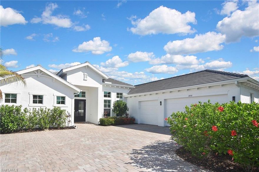 Welcome to WildBlue, one of Southwest Florida’s most desirable luxury lakefront communities. This beautifully upgraded Iris model showcases exceptional quality, thoughtful enhancements, and a premier location that is walkable to the Amenity Center and conveniently positioned near the North Gate for easy access in and out of the neighborhood. The home features 4 bedrooms and 3 bathrooms with an open, modern layout and nearly 800 square feet of screened outdoor living overlooking the water and nature preserve. The chef’s kitchen includes a large island, soft close cabinetry, modern white finishes, high end quartz countertops, stainless steel appliances, and a gas cooktop. Significant owner added upgrades elevate the home well beyond builder standard, including a whole house generator providing full property backup power, a whole house water filtration, softener, and reverse osmosis system, insulated garage doors for improved efficiency, impact windows and doors, all new interior lighting and ceiling fans throughout the home, upgraded lanai ceiling fans for enhanced outdoor comfort, new sod and refreshed landscaping, fresh interior paint, professionally sealed driveway pavers, and professionally cleaned and sealed tile grout. The expansive lanai features a stunning infinity edge saltwater pool and spa with serene preserve and water views, creating an ideal setting for sunsets, wildlife watching, and quiet relaxation. WildBlue residents enjoy world class amenities including an 800 acre lake, resort and lap pools, tennis, pickleball, a fitness center, day spa, private beach, playground, boat ramp with day docks, and the lakeside bar and grill, all within a community located between Naples and Fort Myers with quick access to RSW Airport, Hertz Arena, shopping, dining, and the beaches of Southwest Florida. This home offers a rare combination of luxury, upgrades, location, and lifestyle and is move in ready in one of WildBlue’s most convenient and desirable areas.