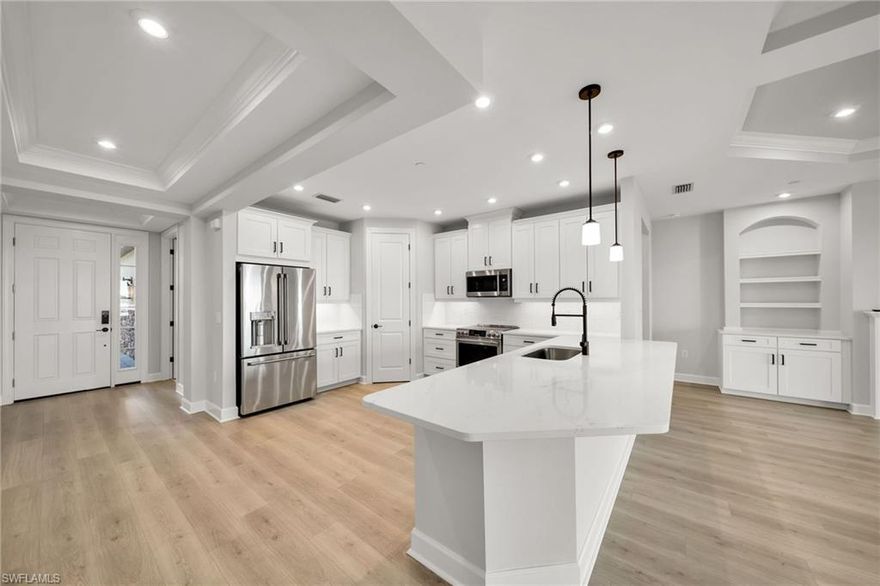 Beautiful and bright first-floor unit located in the highly desirable Esplanade at Hacienda Lakes community in Naples. This residence features numerous upgrades throughout, offering a refined and modern living experience. The open-concept layout is enhanced by high ceilings and abundant natural light, creating a spacious and inviting atmosphere.
2 Bedrooms and 2 Bathrooms, Laundry, Pantry, walking clothes, Garage, screen gallery, open concept Living room and Dinning. Large and open Kitchen.
Enjoy serene lake views from the main living areas, perfectly complementing the elegant interior finishes. The home includes high-end appliances, premium flooring, and quality craftsmanship throughout. Impact-resistant doors and windows provide added value and peace of mind.
The kitchen offers ample cabinetry and counter space, seamlessly connecting to the living and dining areas, ideal for both everyday living and entertaining. The primary suite is well-sized and comfortable, with additional space suitable for guests or a home office.
Residents of Esplanade by the islands enjoy access to resort-style amenities, including a clubhouse, pool, fitness center, tennis, pickleball, and beautifully maintained common areas.
Vacant and easy to show.