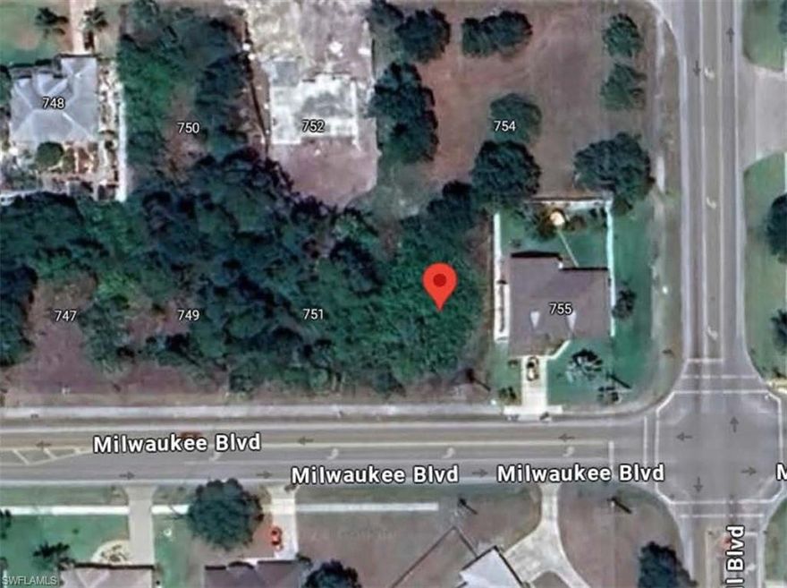 Here's your chance to own a build-able piece of land in Lehigh acres with access to city water and sewer.  This lot is in an area where many new homes are being built.  This property sits across the street from the Mirror Lakes golf course and is close proximity to shopping, dining, and schools.  There many options like spring training centers, airports, beaches and many other activities in the Lehigh/Fort Myers area for you to explore. -profesional photos coming soon-