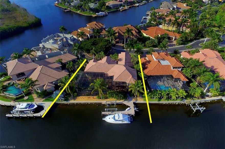 Wyman Stokes built Masterpiece located in the exclusive Harbour Preserve of Cape Harbour. This home has one of the most amazing resort style pool -3 levels and outdoor area in a single family home. Home has just under 5,000 sqft of living. Inside you will find stone floor throughout, custom faux painting, crown molding, tray/coffer ceilings and decorative niches. A custom built-in stone entertainment center fits the home perfect. The Gourmet kitchen boast a 48 inch gas range, decorative hood, built-in refrigerator, gorgeous cabinetry, granite counter tops and a tile back splash. The breakfast area has a huge bay window overlooking the pool. Each of the 3 guest bedrooms have a private full bath. The office is trimmed out beautifully in wood and built-in cabinets. Upstairs you will find a fun entertaining room with a wet bar, surround sound and a large balcony that over looks the pool and preserve.. There is a brand new composite dock, 24k lbs boat lift and separate jet ski lift. With 129 feet of seawall plenty of room for boats