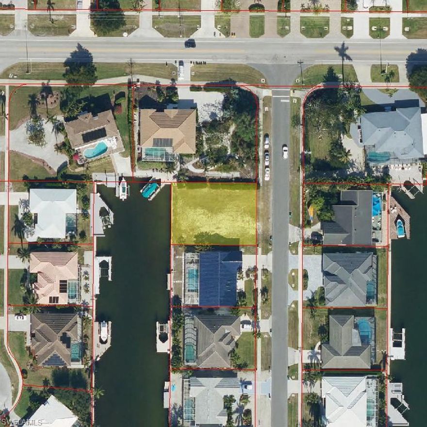 BEAUTIFUL WATER FRONT LOT ON MARCO ISLAND IT SITS ON .20 ACRES WITH THE SEAWALL IN PLACE IT HAS WESTERN EXPOSURE ON INDIRECT GULF ACCESS MUST SEE BEAUTIFUL HOMES ALL AROUND THE ISLAND