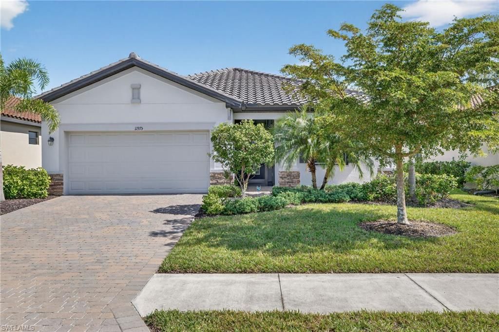 Photo of 11975 Arbor Trace DR, FORT MYERS, FL 33913 (MLS # 225083703)