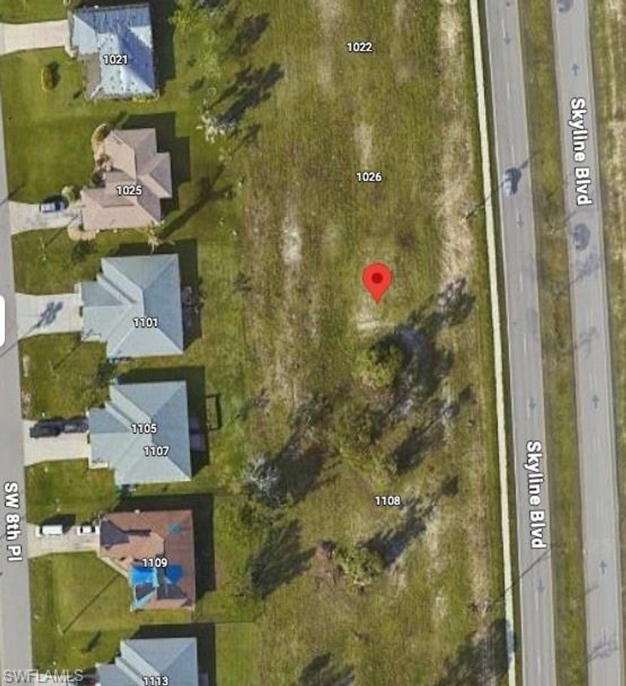 Also selling the lot next it on the right side 1026 commercial lot