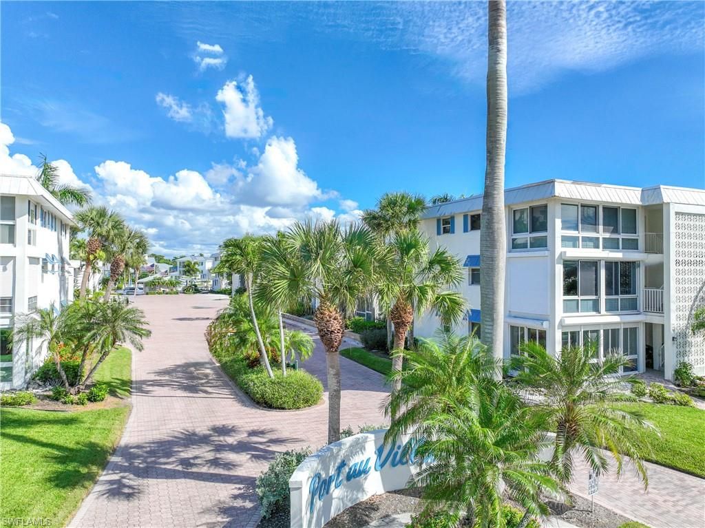 Photo of 2100 Gulf Shore BLVD N #212, NAPLES, FL 34102 (MLS # 226019733)