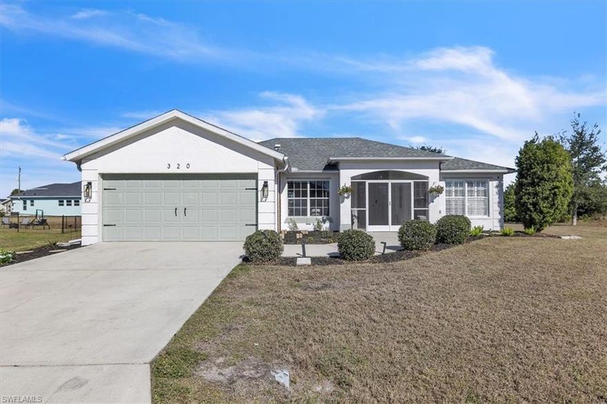 Welcome to your next home in the sought-after Deep Creek community of Punta Gorda! Situated on a large corner lot at the end of a quiet cul-de-sac, this home combines space, privacy, and curb appeal. This inviting 3-bed, 2-bath residence greets you with a welcoming screened-in front porch and double-door entry that sets the tone for relaxed Florida living. Step inside to discover brand-new flooring throughout, vaulted ceilings, and a bright comfortable space. The eat-in kitchen features a breakfast bar, stainless steel appliances, and a cozy breakfast nook, with additional formal dining space perfect for gatherings and everyday meals. The spacious primary suite offers direct access to the screened-in lanai and an en-suite bath with modern fixtures and a dual vanity. Two additional bedrooms boast sliding glass doors to the backyard and are filled with natural light from abundant windows. Outdoor living is a breeze with a large screened lanai overlooking your private backyard, ideal for morning coffee or evening relaxation. The home also is equipped with hurricane protection and a 2023 Roof offering you peace of mind and lower insurance costs. You are also located in a X flood zone which does not require flood insurance. Located in the deed-restricted Deep Creek area of Punta Gorda, this home is part of a friendly community known for its peaceful streets, nearby golf, parks, and greenbelts. Deep Creek offers easy access to I-75 for commuting, and you’re just a short drive to historic downtown Punta Gorda, waterfront shopping and dining at Fishermen’s Village, boating and fishing on Charlotte Harbor, and the area’s beautiful Gulf beaches. You don't want to miss the best of Florida living with all this home has to offer!