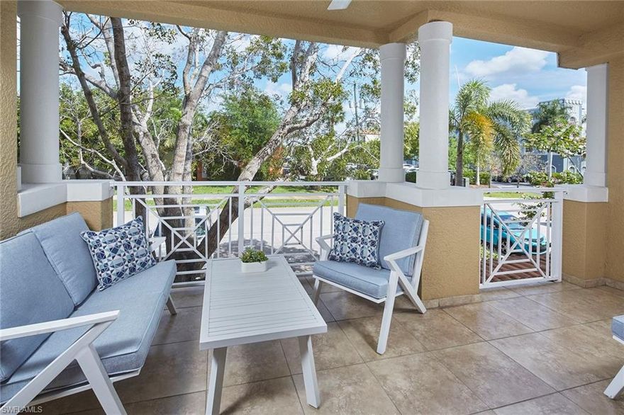 Welcome to this 3BR, 2 Bathroom condo located at The Residences at City Centre of Naples. Built in 2008, this residence offers 1,869 square feet of interior living space within a boutique building of only 12 residences, providing a more private ownership experience and a walkable city living environment. The interior features hard surface flooring throughout the main living areas, with both guest bedrooms finished with carpet. The great room provides direct access to a private balcony, creating a seamless connection to outdoor living. A formal dining room is positioned adjacent to the kitchen, which includes new countertops, newer appliances, a pass-through to the dining area, and a breakfast nook currently utilized as a home office. The kitchen nook also offers additional balcony access. The primary suite includes dual walk-in closets and a bath with dual sinks, a separate tub, and a walk-in shower. Both baths have been updated with upgraded finishes. Impact-resistant glass doors and windows are installed throughout the property. Residents have access to a private community pool and spa with bathrooms located on the south side of the building, plus an outdoor terrace and grill area. Parking includes a private single garage and additional under-building, secured enclosed parking. The location offers close proximity to area beaches, medical facilities, and a variety of dining and shopping destinations, supporting a walkable lifestyle within Naples.