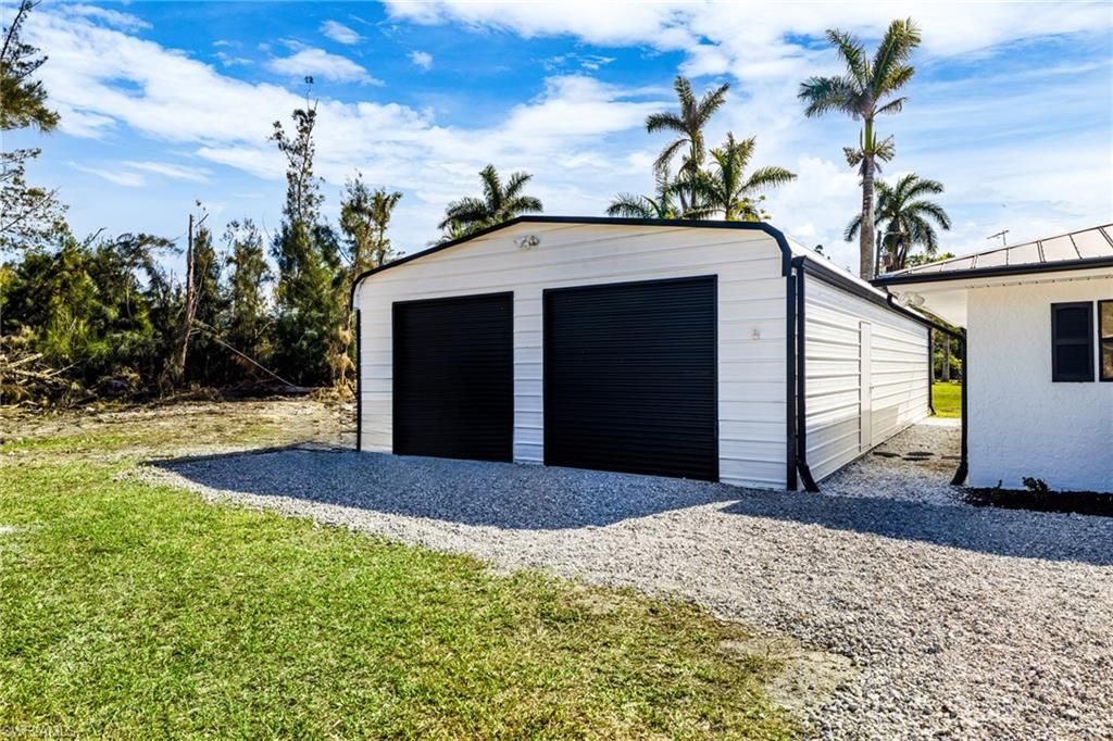 Photo of 3429 Sleepy Hollow LN, PUNTA GORDA, FL 33950 (MLS # 225083932)