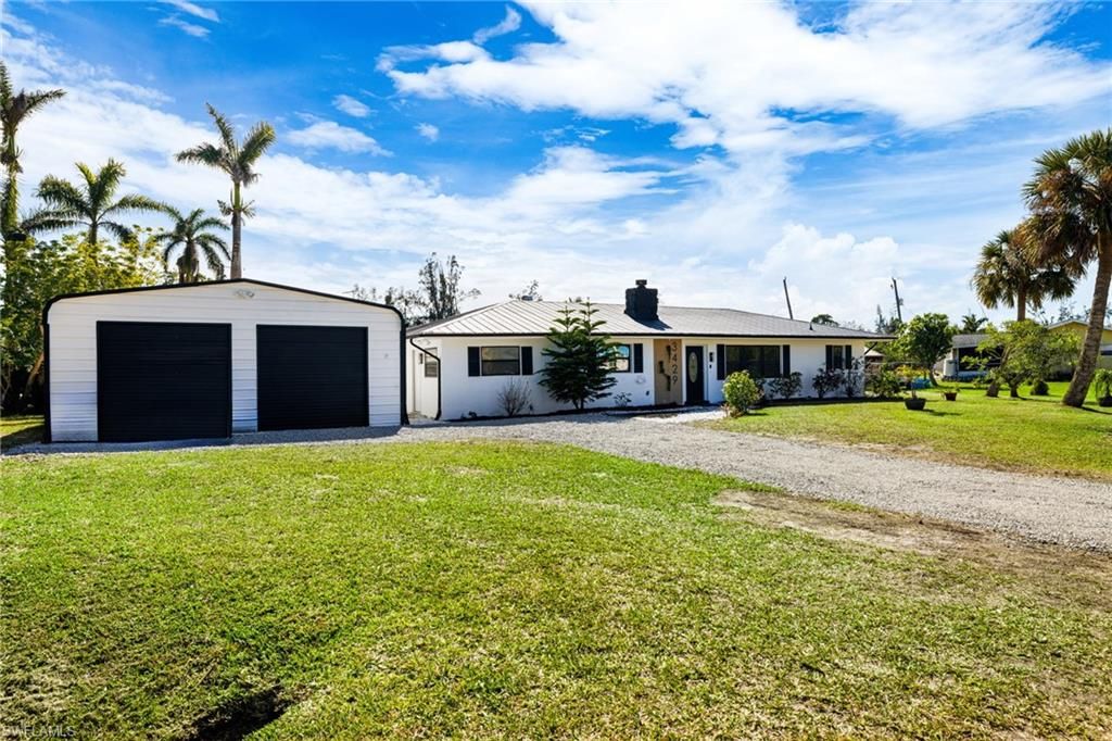 Photo of 3429 Sleepy Hollow LN, PUNTA GORDA, FL 33950 (MLS # 225083932)