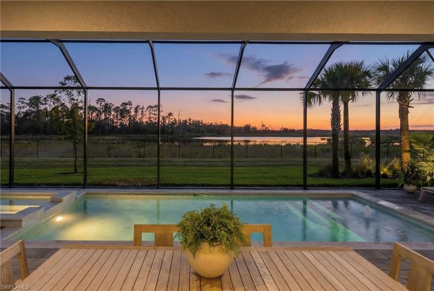 ALL THE ESTATE LOTS ARE SOLD OUT - This is it! Welcome to a truly one-of-a-kind estate home in Verdana Village, on the BEST LOT where timeless craftsmanship, modern luxury, and an irreplaceable setting come together in perfect harmony. This expansive 6-bedroom + loft, 3 full-bath residence with 3 car garage is set on premium oversized homesite offering serene lake and preserve views, delivering a level of privacy and natural beauty that is becoming nearly impossible to find.     
                                                                                                                                                                                                                 
Inside, the home is richly appointed with crown molding, designer lighting, and custom woodwork, with quality craftsmanship rarely seen by today’s standards. A beautiful custom built fireplace that anchors the main living area. The chef’s kitchen is equipped with a built-in wall oven, Natural gas cooktop, premium cabinetry w/ pot and pan drawers, quartz countertops throughout — all new custom designer finishes.  A spacious open floor-plan complimented by soaring 9.5 ft ceilings and 8-foot doors on both levels, enhancing the home’s warm yet refined atmosphere.       
                                                                                                                                                                       
The true showstopper lies outdoors. Step onto your massive 50-ft wide covered patio and take in the sights and sounds of nature—morning coffee while watching flocks of bird’s glide over the pond and deer grazing in the preserve, then unwind in the evenings with jaw-dropping sunset views by your custom-built pool and spa.  It’s a sanctuary, designed for entertaining, making memories, and everyday enjoyment. The outdoor space features a custom full outdoor kitchen positioned opposite a stunning entertainment wall with an electric fireplace, creating a resort-style setting right in your backyard.      

All hurricane impact windows and doors, Flood Zone-X (no flood insurance required) 40-ft paver driveway, 70x150 ft deep OVERSIZED pie shaped lot that opens to 88-ft in the back.  Giving you plenty of privacy and gorgeous unobstructed views from every window of the home.     
                                                                                                                                                                       
This model is no longer offered by the builder, and homesites of this size are becoming increasingly rare as lots get smaller and homes get narrower.  Simply put, this is a home that cannot be built again. This is more than just a home; this is a lifestyle upgrade.  A property like this doesn’t just offer space and upgrades—it’s a statement of perspective, exclusivity, and permanence. Opportunities like this rarely present themselves twice.  This is your chance—schedule your showing today!