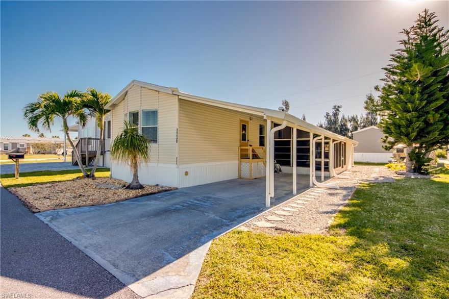 Beautifully maintained 2-bedroom, 2-bath manufactured home located in the highly desirable 55+ community of Pine Island Cove, where residents enjoy low HOA fees $160 month and a relaxed coastal lifestyle. This home offers a bright, open layout with a spacious living area, an inviting kitchen, and comfortable bedrooms designed for easy year-round living or a warm winter retreat. A large lanai provides the perfect spot to enjoy morning coffee or evening breezes, and the attached carport adds convenient covered parking. This home was set at a higher elevation. 
The property sits on an owned lot—no land lease—and the community offers outstanding amenities including a heated saltwater pool, hot tub, clubhouse, boat ramp, pickleball, and organized activities. Pine Island Cove is golf-friendly and located just minutes from waterfront dining, marinas, and all the charm of St. James City. It has a Gulf Access boat ramp just minutes out to some of the best fishing in SW Florida and the beach at Cayo costa.