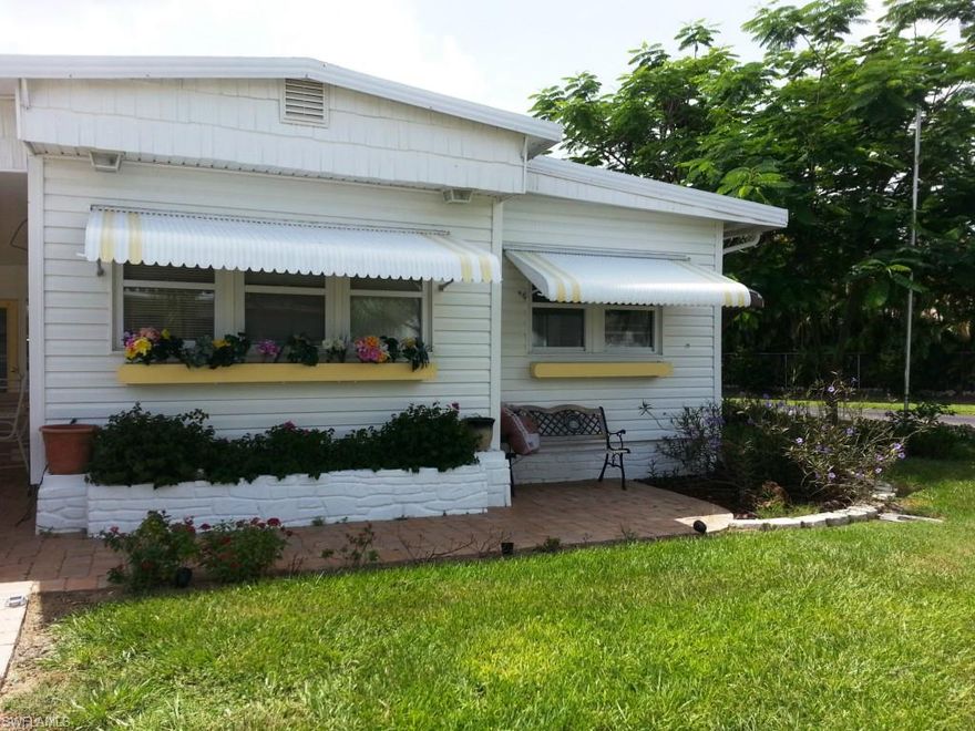 Your chance to live only minutes from the beach.  This home has been updated to include updated kitchen cabinets with granite counters and a breakfast area, wood and tile flooring, updated bathroom cabinet with granite counter. This home has a great open living/dining area with lots of natural light. The home has tons of storage and a huge laundry room with tub off the 2nd living area. Brick paved driveway leads into the paved carport area. This is an over 55 Community with clubhouse and pool in a super neighborhood! Thunderbird is known for it's friendly people, great location, good amenities, and low fees and so close to Ft Myers Beach, Sanibel and shopping - what more could you want - call today for a personal tour.