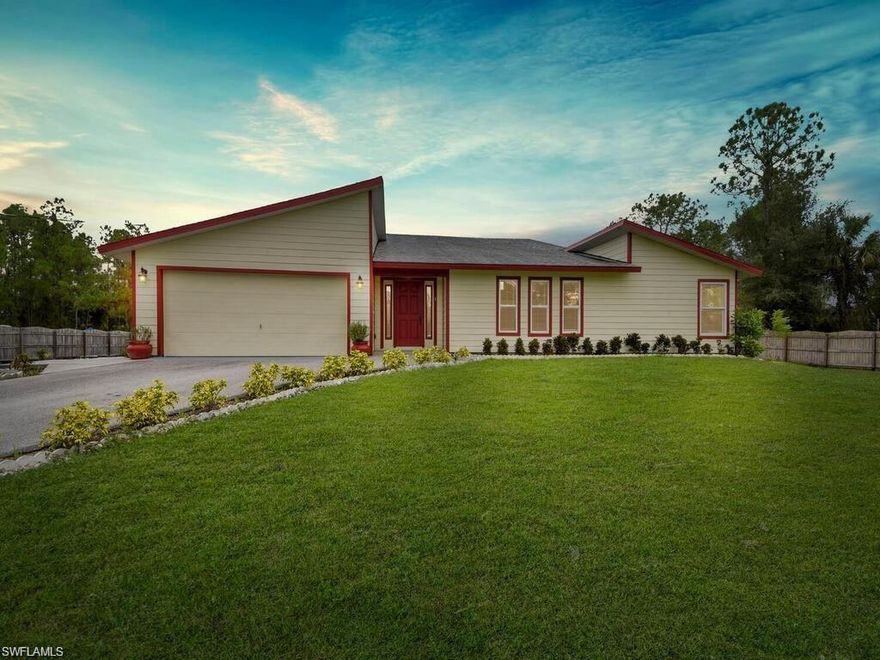 Charming and Stylish Single-Family Home with Expansive Yard. Welcome to this beautifully maintained 3-bedroom, 2-bath home that perfectly blends modern comfort with timeless curb appeal. Nestled on a generous lot, this single-story property features a fresh exterior with cream-colored siding accented by bold red trim, a welcoming front porch, and a two-car garage. This home sits on 2.27 acres, fenced and with a gate. You are invited to come and tour this charming home and take in the sense of peacefulness and serenity the Estates has to offer! The meticulously landscaped front yard offers exceptional curb appeal with well-manicured grass, vibrant flower beds, and a curved stone border that leads to the entryway. Large windows invite natural light into the home, while the private fenced backyard offers both peace and potential for entertaining or relaxing. With its clean lines, contemporary architectural details, and serene surroundings, this home is a standout in both design and livability.