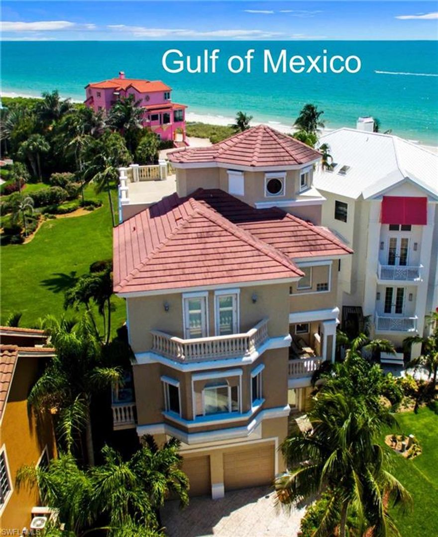 Wow! Almost a $250,000 PRICE REDUCTION just taken! MAKE YOUR OFFER!! Spacious 4 BR, 3 full bath BUILDER'S ALL-CONCRETE home with STORM PROTECTION AND fabulous BEACH VIEWS. Entertain in the gorgeous eat-in kitchen which opens to a family room, or serve your guests in the formal dining room. Builder’s touches include floating staircase, tray ceilings, custom paint, extra crown moulding & NEW ROOF. Enjoy the sights & sounds of the Gulf of Mexico from the balconies located off the family room, master bedroom & EACH guest bedroom. For the PREMIER view of Barefoot Beach, take friends to your ROOF-TOP TERRACE overlooking the bluest waves in Southwest Florida. Watch for dolphins, walk the beach, fish from the shore & meet friends poolside. End each day with the most beautiful sunsets on earth. It’s all part of the alluring and exciting Barefoot Beach lifestyle. Clubhouse, fitness & security provided with LOW HOA FEES. Fifth bedroom and 4th bath option available - ask for details. Call today to be one of the first to see this beach palace and experience your piece of Paradise! COME IN, RE-IMAGINE, AND MAKE IT YOUR OWN!