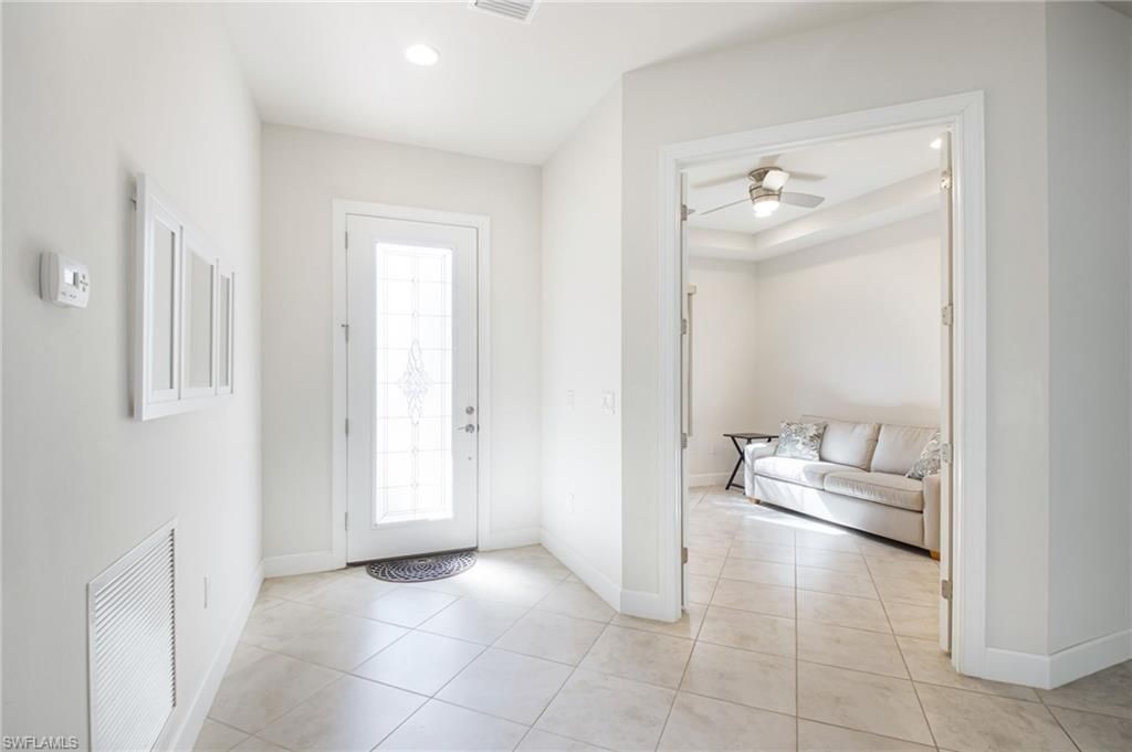 Photo of 9074 Triangle Palm LN, FORT MYERS, FL 33913 (MLS # 226015667)