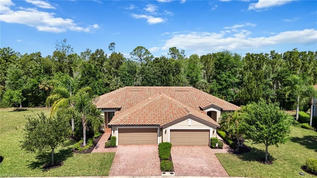 Photo of 9074 Triangle Palm LN, FORT MYERS, FL 33913 (MLS # 226015667)
