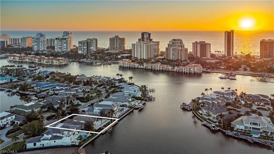 Incredible building opportunity offering 104' of wide northern and western Bay views situated on a quiet street. Perfectly nestled between two new homes, this property is within walking distance to Venetian Village, Park Shore private beach, and Waterside Shops. Existing improvements are being sold in as-is condition. MHK schematic available to show new construction potential upon request.