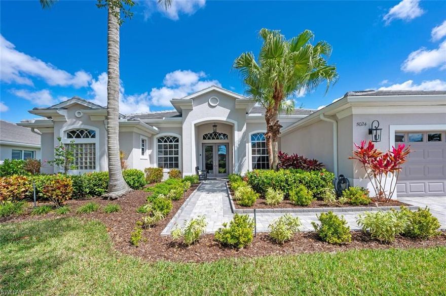 Welcome to 5024 Castlerock Way, an exquisite residence in Naples Lakes Country Club, where IMMEDIATE GOLF MEMBERSHIP to the Arnold Palmer signature golf course awaits — an incredible advantage in this highly sought-after bundled golf community. Set within a gated neighborhood with 24-hour staffed guard gate, this home offers exclusivity, peace of mind and effortless luxury. This beautiful completely refashioned three bedroom, plus den, three bath home features new kitchen finished with custom cabinetry, stainless appliances, granite counters. Throughout you will find elegant designer finishes. Recent updates include roof (2023), paver driveway and walkway (2024) a revitalized pool and deck area (2024) for a polished and inviting ambiance. Your private outdoor retreat awaits on the lanai, where a sparkling pool and spa are surrounded by lush, colorful foliage with views of the golf course. The setting is both tranquil and picturesque. Residents of Naples Lakes Country Club enjoy a host of amenities, including the newly constructed Arnie’s Cabana, a casual outdoor dining venue ideal for relaxing with friends and family. The grand clubhouse features fine dining, a state-of-the-art fitness center, tennis courts and an active social calendar, ensuring there’s always something to enjoy. Ideally located, this home is just minutes from Naples’ pristine white sand beaches and the upscale shopping, dining, and entertainment of 5th Avenue South and 3rd Street South.