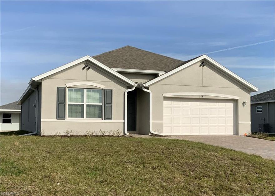 Enjoy relaxing on the covered lanai in this serene country setting. 4 bedrooms, 2 bathrooms, one-story home in Banyan Village, featuring a bright and inviting open-concept layout. The modern kitchen offers quartz countertops, stainless steel appliances, white cabinetry, a large center island, and a walk-in pantry perfect for everyday living and entertaining.

The dining and living areas overlook the covered lanai with pavers to match the driveway, creating seamless indoor-outdoor flow. The private primary suite comfortably fits a king bed and features dual vanities, a spacious walk-in closet, and a separate linen closet.

Additional highlights include tile flooring throughout, abundant storage, and storm shutters for added peace of mind.