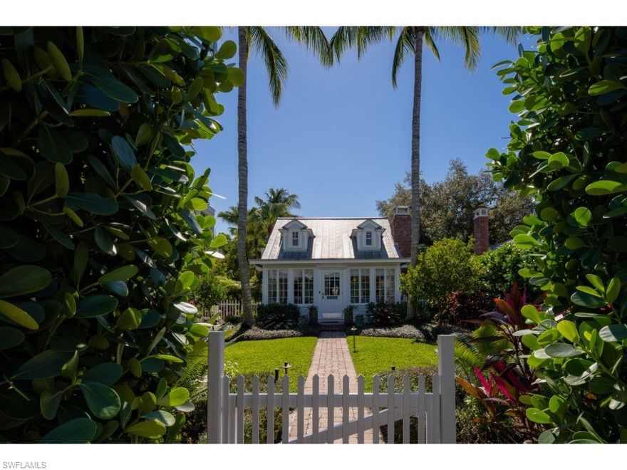 The quintessential Old Naples Cottage! The main house features two bedrooms, a den, two baths, a beautiful kitchen, and multiple spaces for intimate conversation or relaxation. The rear covered porch overlooks the pool and adjacent outdoor entertaining space with desirable southern exposure. The separate guest house provides comfortable accommodations for guests including a living room, kitchen, and private bedroom. Note, the square footage computations and bedroom/bathroom counts reflect the main house and guest house totals.
Alley access in the rear with a garage and covered carport. Conveniently located in Old Naples, just a few blocks from the world-class shops and restaurants of Third Street South, this enchanting residence is also just three blocks from Naples famous sugar sand beaches. A rare opportunity to own a piece of Naples History!