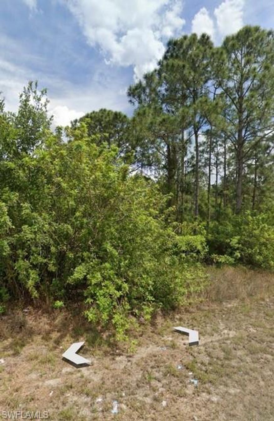 Nice 1/2-acre residential lot located in a growing area of Lehigh Acres, close to main roads with easy access to shopping, dining, and schools. Buyer/Buyer’s agent to verify all information including zoning, lot dimensions, flood zone, utility availability, and building requirements. Drive by and make an offer!