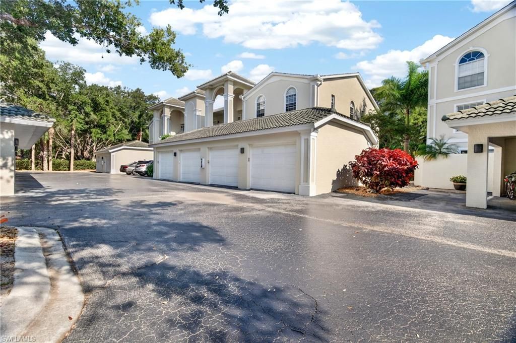 Photo of 15395 Cedarwood LN #104, NAPLES, FL 34110 (MLS # 226016826)