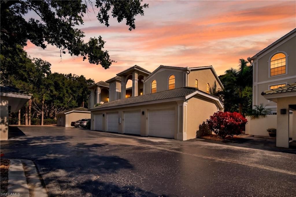 Photo of 15395 Cedarwood LN #104, NAPLES, FL 34110 (MLS # 226016826)