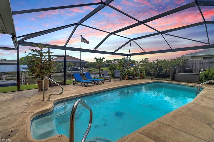 Welcome to your dream home in the heart of paradise! This stunning GULF ACCESS single-family home is TURNKEY FURNISHED for a seamless and stress-free move-in experience. The home boasts 3 bedrooms, 2 bathrooms, bonus room (or 4th BR upgrade), 2-car garage, and a fenced-in yard which is perfect for a growing family or those who love entertaining. Step inside one of the 3 sets of pocket sliding glass doors and be greeted by the sleek granite countertops, vaulted ceilings, new LG smart stainless-steel appliances, large under-air laundry room with butler's pantry, 20” tile and luxury vinyl flooring throughout. 

This home features an oversized lanai with an elite sunroom/entertainment area, including a full-size refrigerator/freezer, dartboard, 2 TV’s, 12-ft retractable projection screen and tuner, credenza, bar/wine rack, and multiple dining areas for all your entertaining needs. The lanai is complete with an outdoor shower and is pool bathroom accessible. The solar-heated saltwater cement pool is the perfect oasis for relaxing and enjoying the beautiful Florida weather. With rear-facing southern exposure and a large panoramic screen, you can soak up the sun all year round and witness stunning sunsets. This home also offers a 10,000# boat lift with UV canopy and an upgraded Trex composite low maintenance decked dock, w/240v & fresh water. The grilling area features an extensive herb garden, a sports kamado smoker, 2 propane grills plus storage for all your grilling needs - ideal for hosting summer barbecues and outside dining. 

Rest easy knowing that this home has NEVER FLOODED. Sellers chose to obtain flood insurance which is a transferable $1083 policy to the new owner’s [please verify with insurance agent.] 

This home has been enhanced with many improvements including smart AC, ductwork, attic insulation, remodeled primary bath, smart water heater, shingled roof, super screen pool cage, insulated roof over the sunroom, cement pool, saltwater conversion, solar heat, emergency generator with built-in service panel switch, whole house surge protection, dock, boat lift, 120v, UV canopy, native fruit trees and vegetation, hurricane impact windows and doors, hurricane garage door with smart opener, UV patio sunshades, 30’ Flag pole, state-of-the-art smart home automation and security, 4 point inspection prep, main electric panel with 240v supply mast, home is surrounded by an inground 4-zone timed vegetation irrigation drip system plus the standard 5-zone lawn sprinkler and a 1000-gallon rain collection system to aid pool and plants during the offseason. 

Don't miss out on your opportunity to make this your forever home and live the Ultimate Florida Lifestyle!!